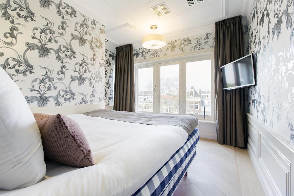 Amsterdam Canal Residence Стая снимка